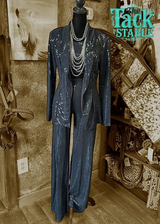 Long Cool Woman In a Black Suit